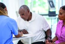 Elderly couple visit the doctor.