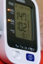 A digital display of a high blood pressure measurement