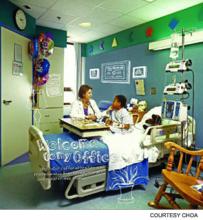 Corinne Taylor, MD, Egleston's chief of medical affairs, attends to a patient at Egleston Hospital. This image was featured in an internal CHOA publication.