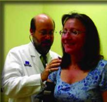 Dr. Oxenhandler, a hospitalist at Hollywood (Fla.) Memorial Regional Hospital, examines a patient.