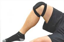 The ActiPatch device is held in place with a wrap around the knee.