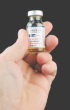 Medicine vial of methotrexate, made by APP Pharmaceuticals. Vial is partially full.