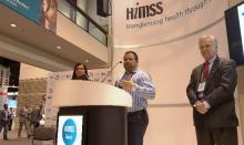 F. Phil Cartagena speaks at the 2015 HIMSS annual meeting. Also pictured are speakers Betty Gomez, left, and Jon Melling. 