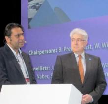 From left, Dr. Raj R. Makkar and Dr. Franz-Josef Neumann discuss the results of their studies.