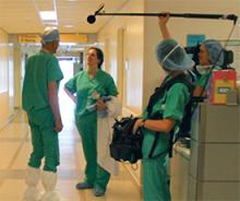 A film crew captures Drs. Crystal and Johnson chatting between deliveries at Santa Clara (Calif.) Valley Hospital.