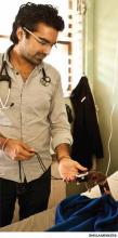 Dr. Varun Verma with a patient at St. Thérèse Hospital, Hinche, Haiti