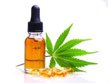 cannabis products with leaf, capsules and CBD oil