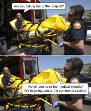 Patient being loaded onto ambulance -- experts are in the comments section