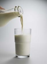 Milk being poured into a glass