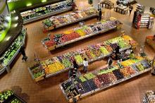 Overhead view of the produce section of a supermarket