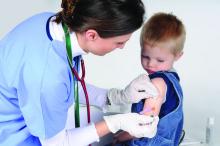 young boy being vaccinated