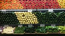 Produce displayed on grocery store shelves