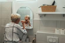 woman brushing teeth