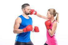 Man and woman boxing